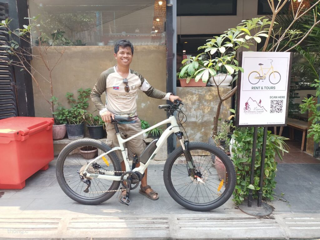 Support sustainability by e-bike rental and cycling around Angkor Wat in Siem Reap.
